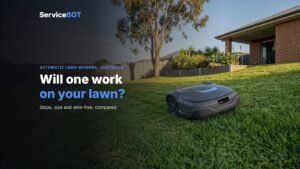 ServiceBot guide cover: a robot lawn mower on a sloping Australian backyard lawn with a Colorbond fence and gum tree, headline Will one work on your lawn