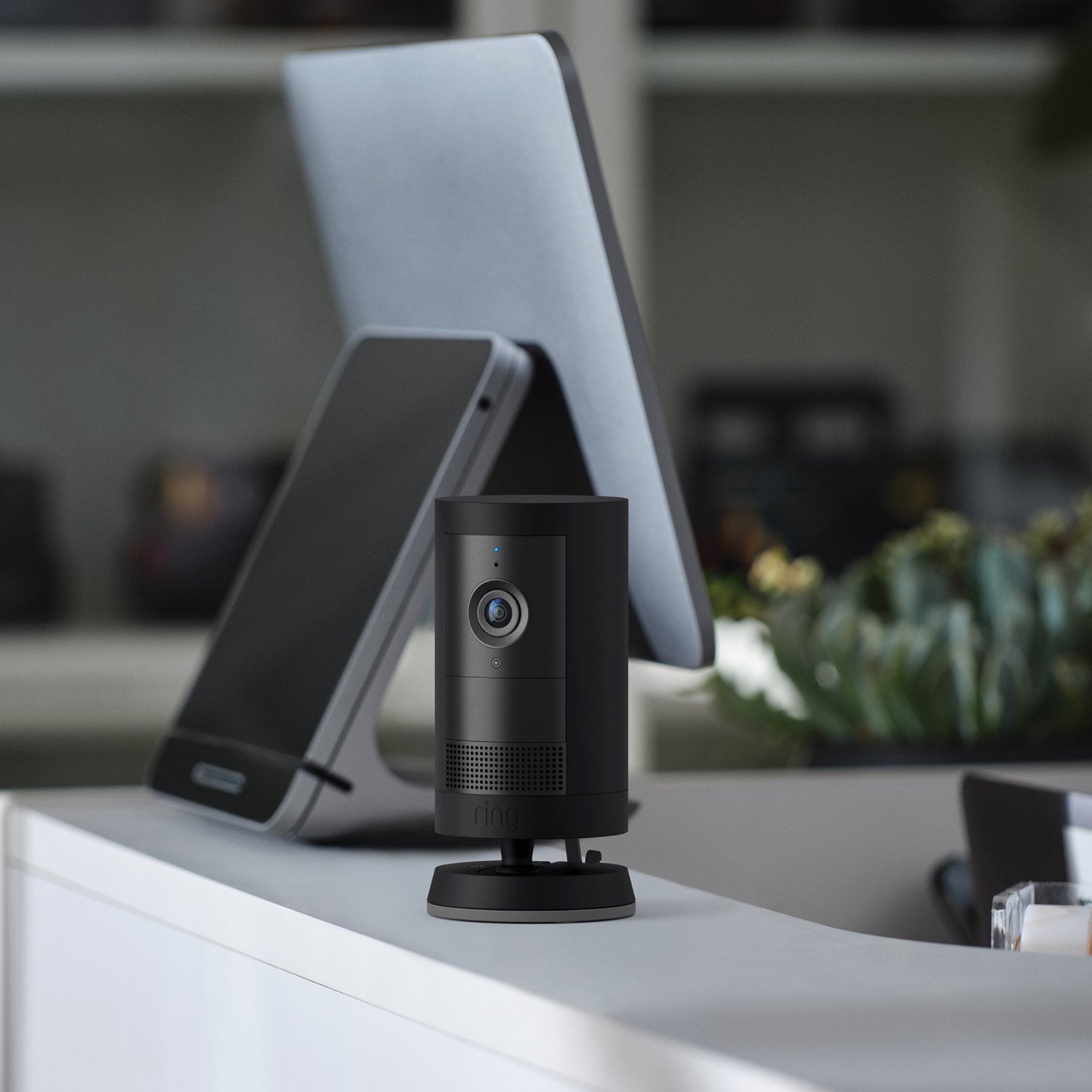 Ring Outdoor Camera Plus Battery in black, mounted outdoors