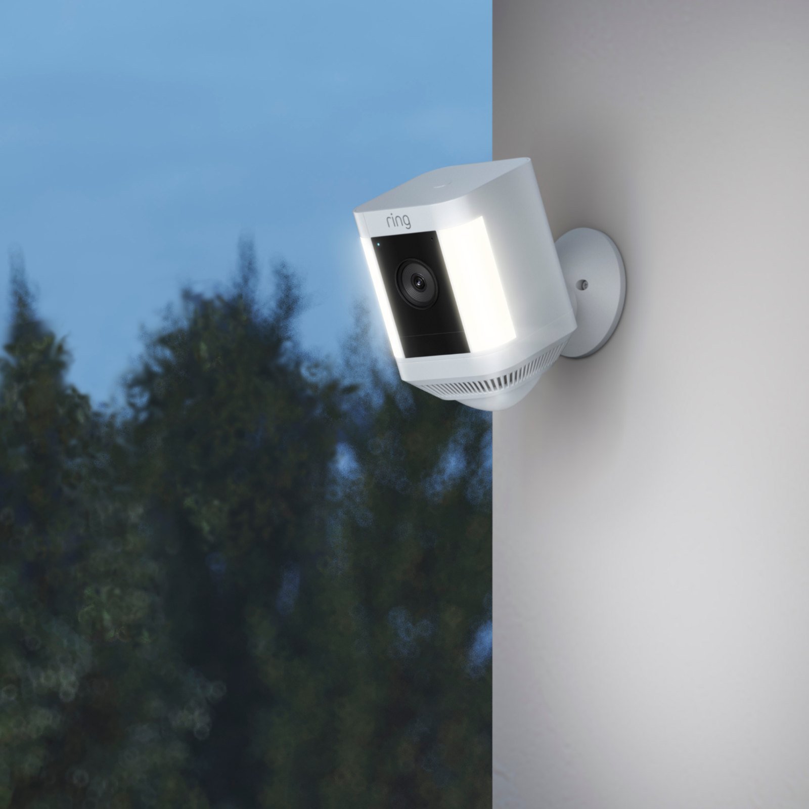Ring Spotlight Cam Plus Battery in white, outdoors