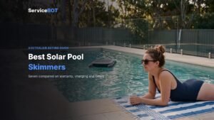 A woman in sunglasses lies on a towel beside a backyard pool while a small solar-powered robotic skimmer floats on the water behind her